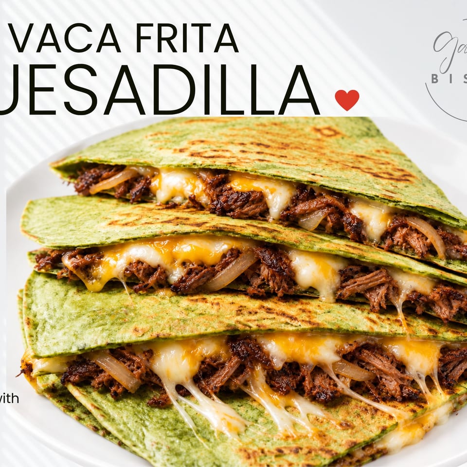Stacked green tortillas filled with shredded beef, sautéed onions, and melted cheese on a white plate, advertised as a birria quesadilla.